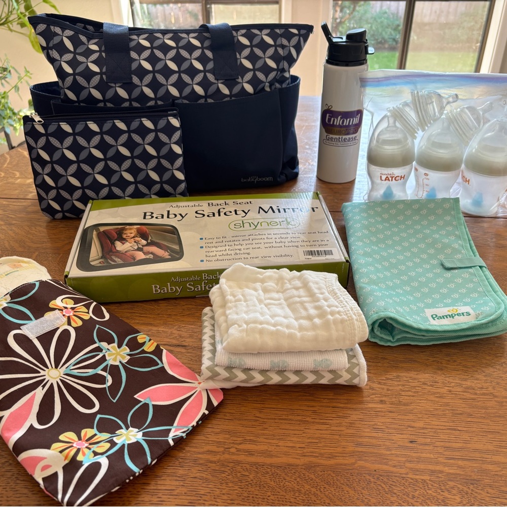 Navy and White Patterned Baby Accessory Bag filled with Baby Items